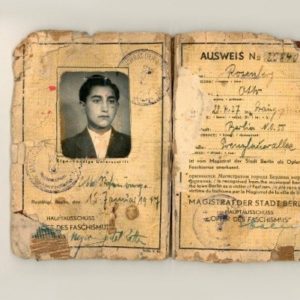 Otto Rosenberg ID card | Roma Holocaust Resources with a photo of Otto Rosenberg on a dull yellow worn by time Ausweis
